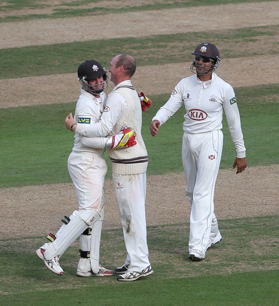 Steven Davies gives Gary Keedy a hug