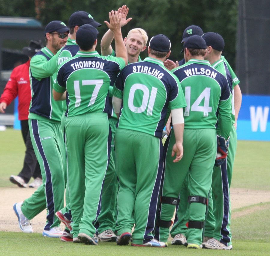 Eddie Richardson celebrates his first international wicket for Ireland
