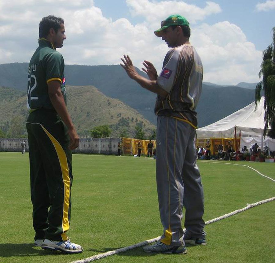 Mohammad Akram instructs one of his wards amid a magnificent backdrop