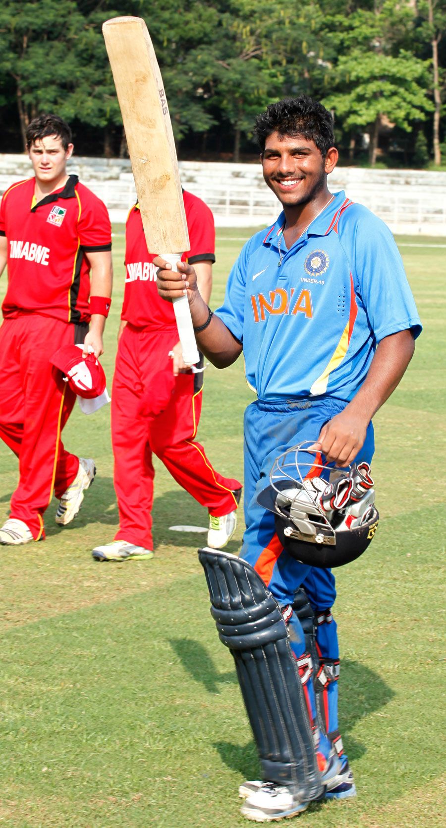 Akhil Herwadkar shows his pleasure after an unbeaten 88