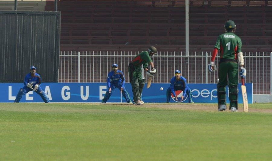 Fifteen-year-old Gurdeep Singh defends the ball
