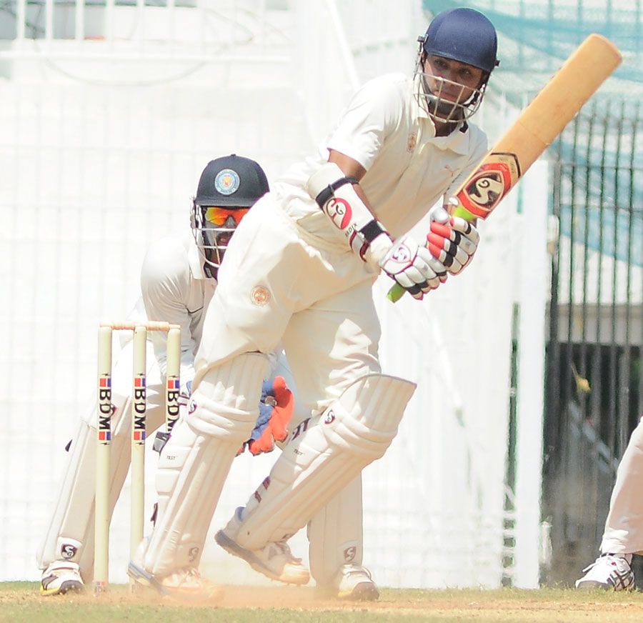 Aditya Waghmode works one away to the leg side 