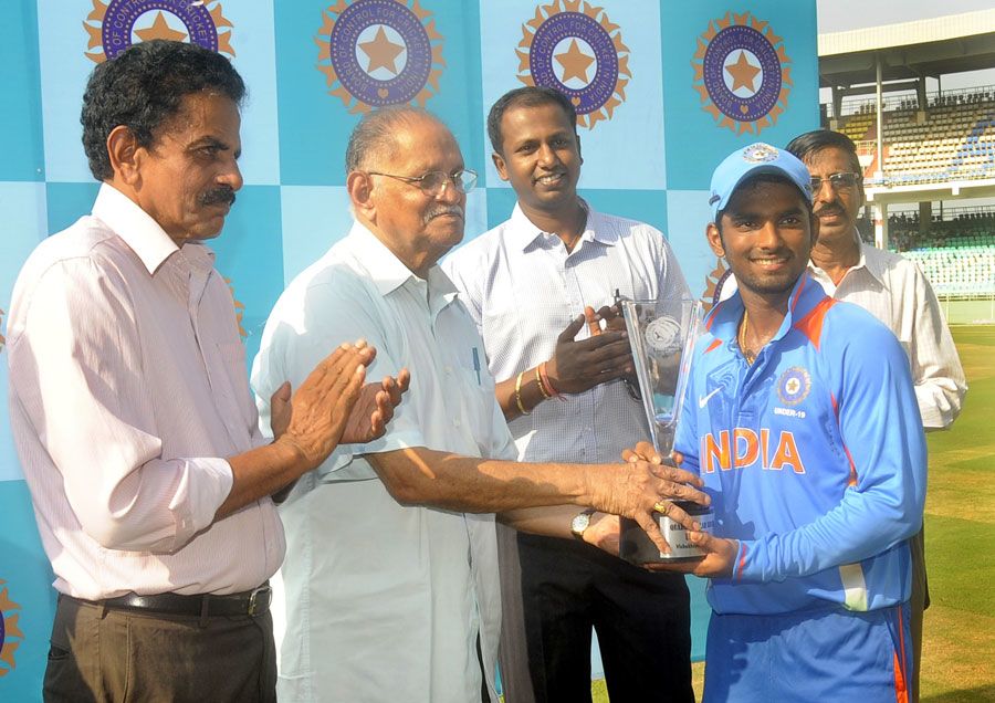 India captain Vijay Zol picks up the winner's trophy