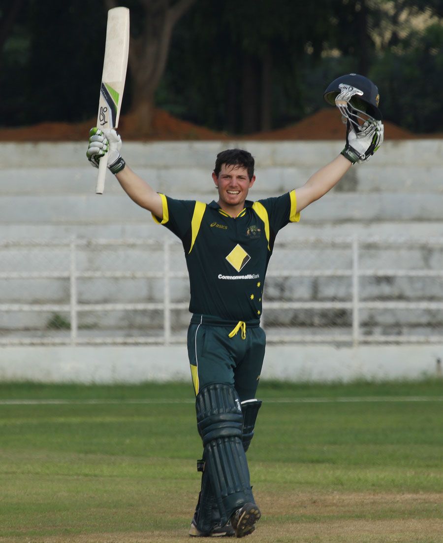 Damien Mortimer celebrates a century