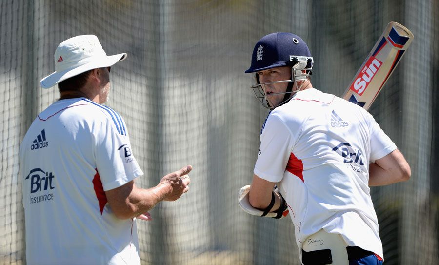 Graeme Swann receives batting tips from Graham Gooch in the nets