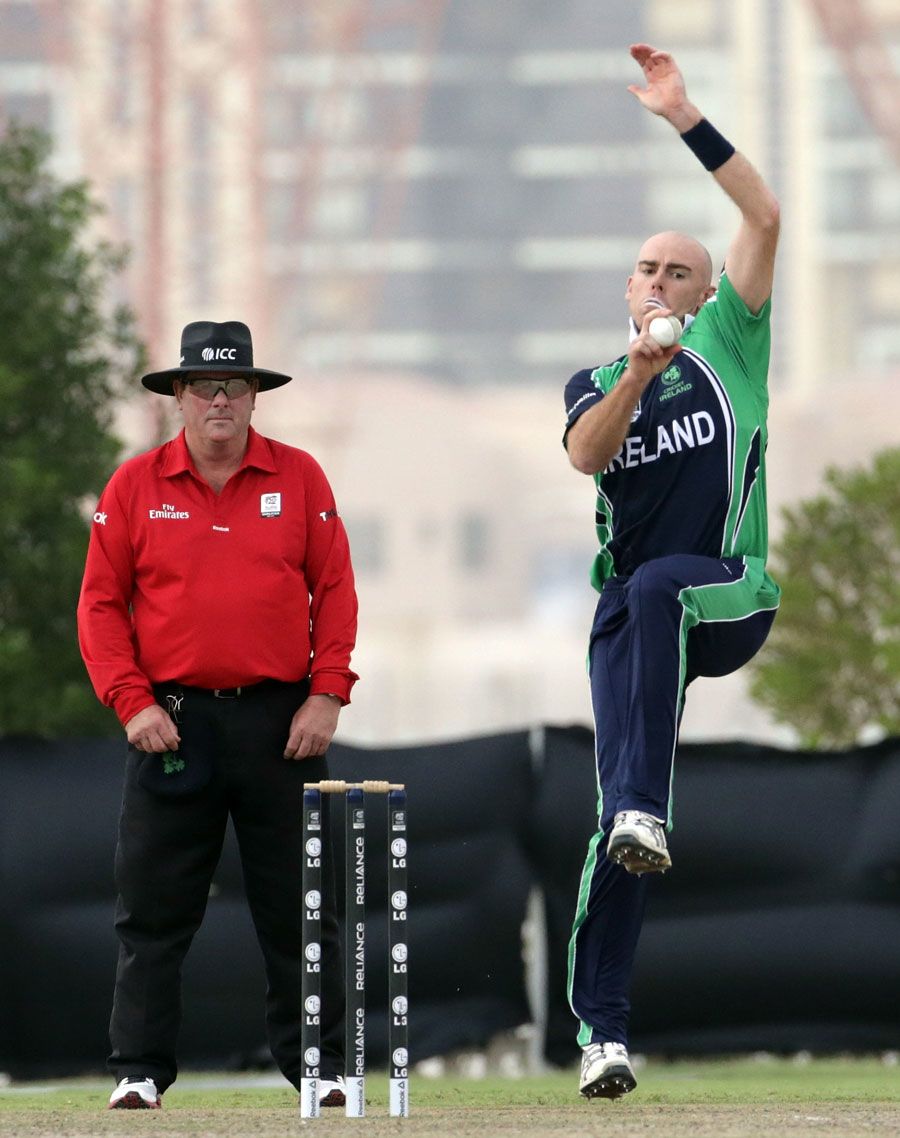 Trent Johnston in his delivery stride