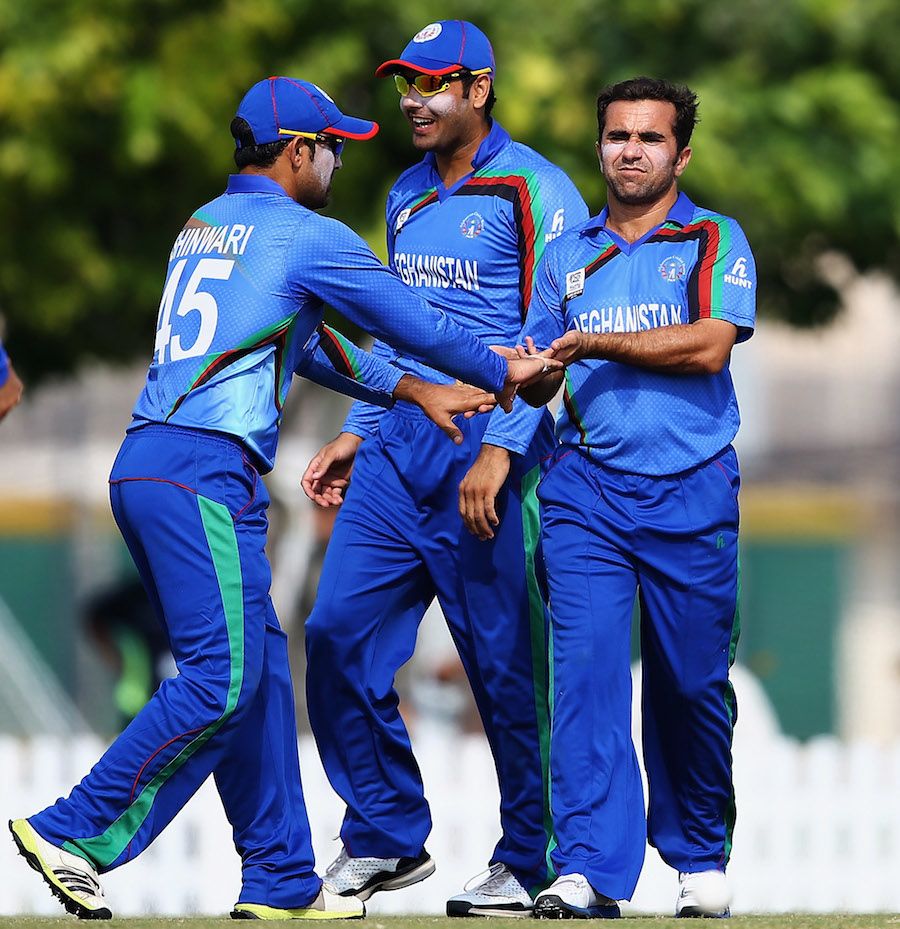 Karim Sadiq is congratulated by team-mates