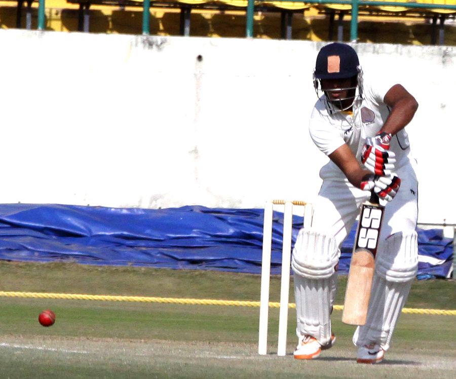 Hyderabad's Ravi Teja blocks one during his 73