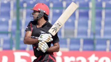 All-round Afzal leads HK to massive win