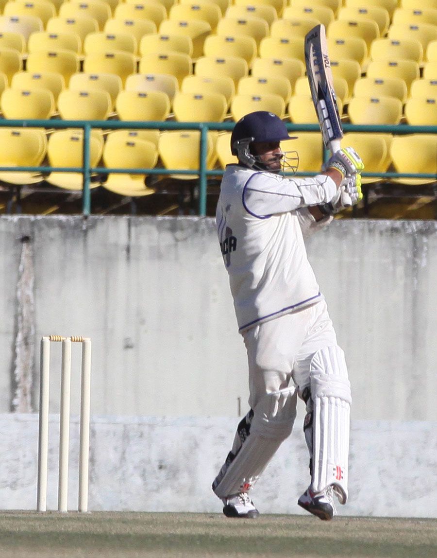 Nikhil Gangta pulls during his 99