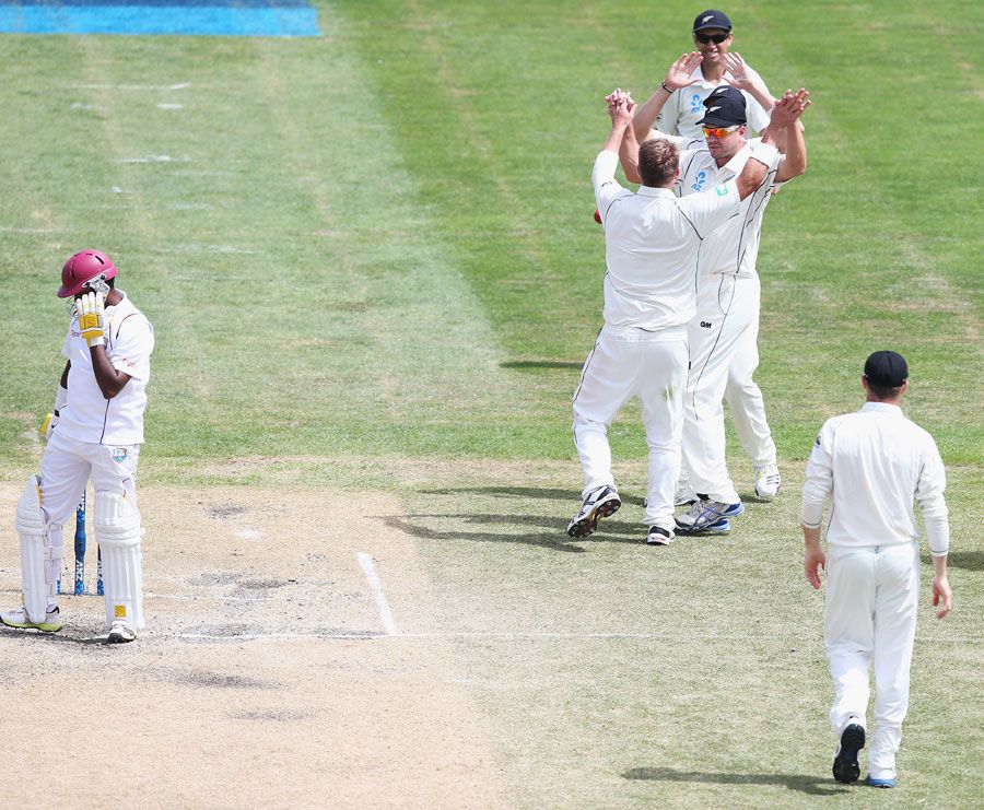 Corey Anderson celebrates after getting Narsingh Deonarine out for 52