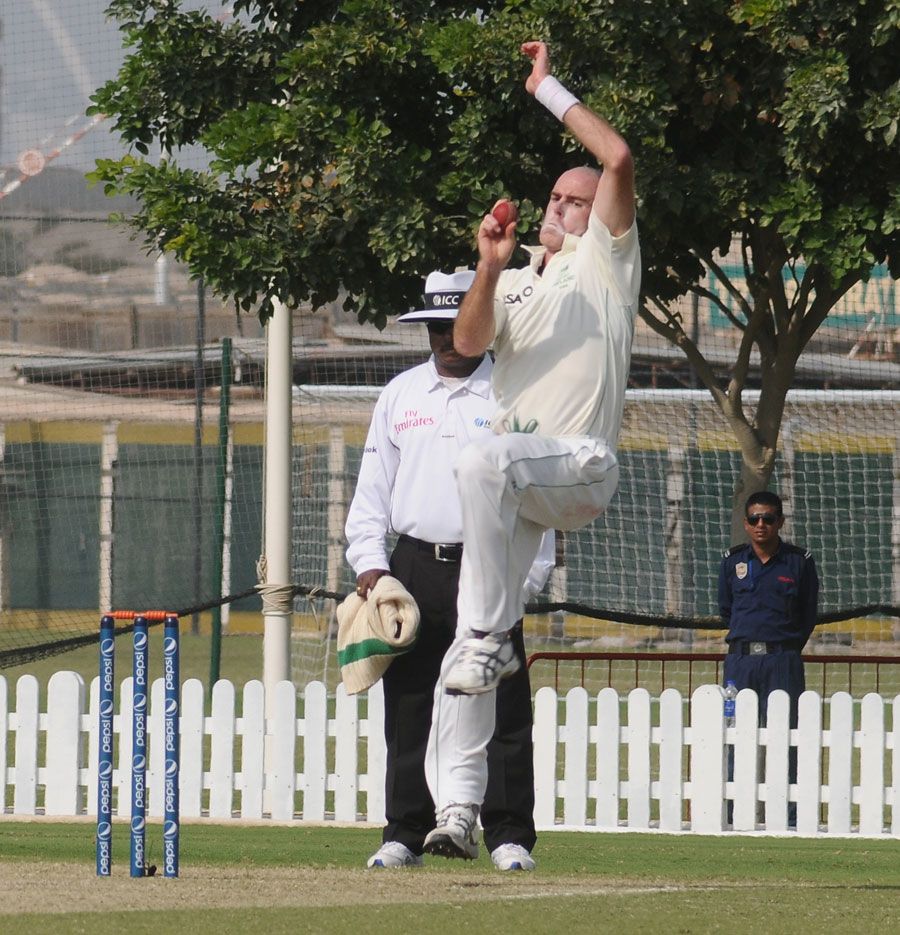 Trent Johnston in his delivery stride