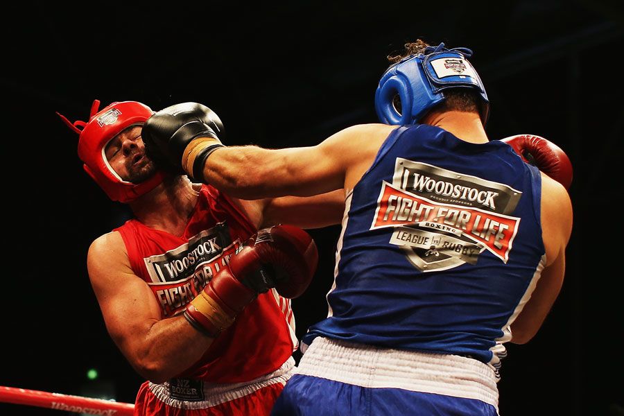 Chris Cairns connects with Simon Doull's jaw at a boxing match