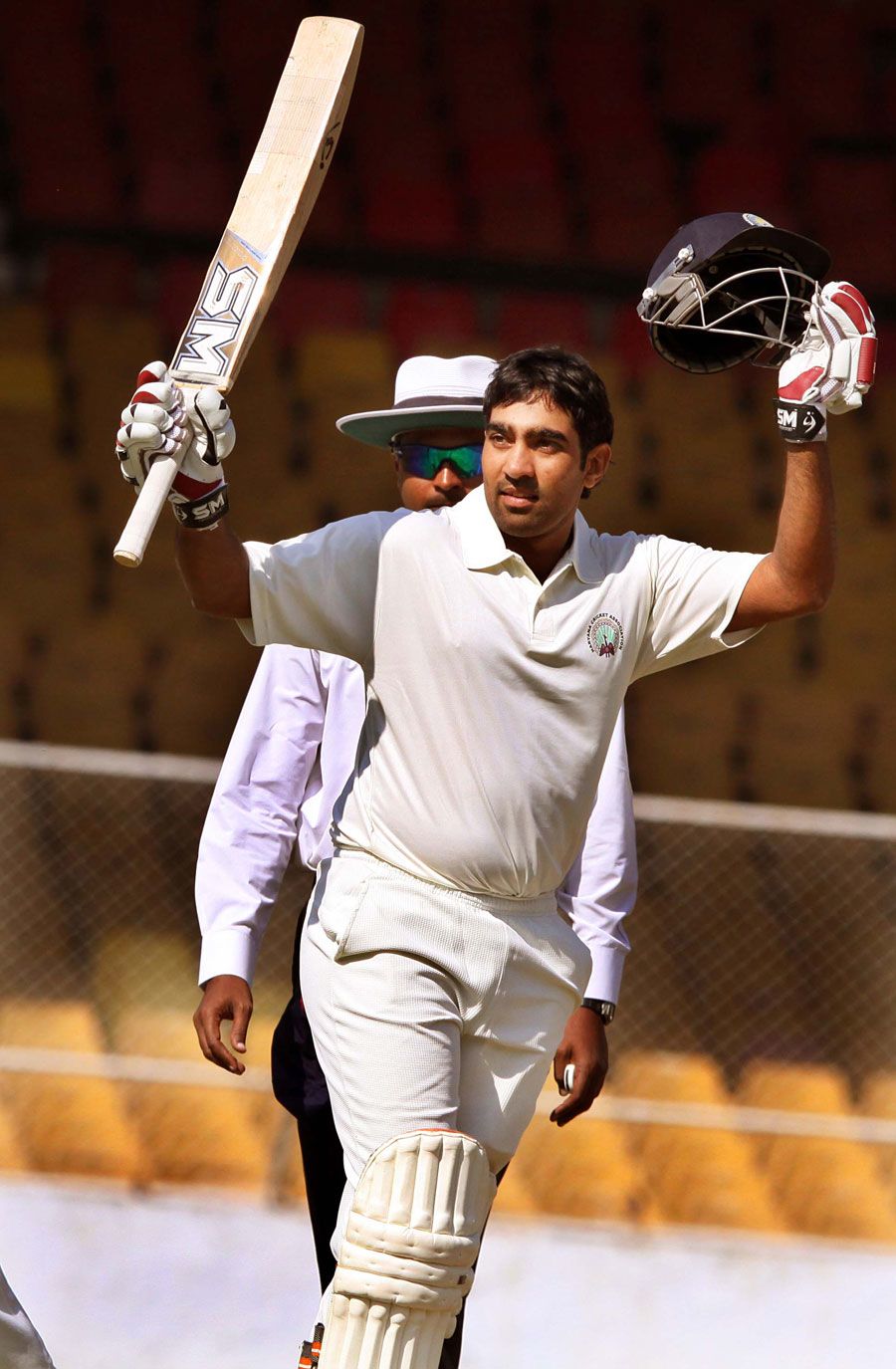 Sunny Singh acknowledges the crowd after reaching a double-century