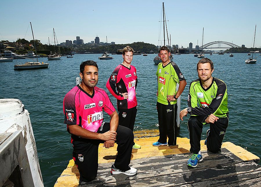 Ravi Bopara, Steven Smith, Michael Hussey and Dirk Nannes pose with the Sydney Harbour Bridge at the background