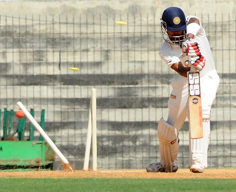 S Badrinath was bowled for 50