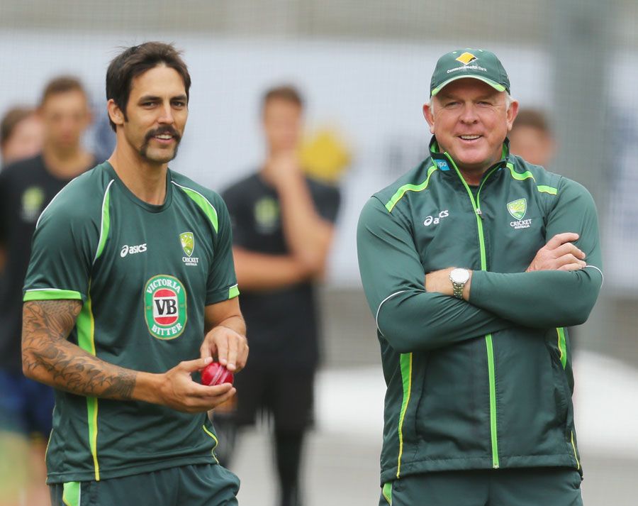 Mitchell Johnson and Craig McDermott at a training session