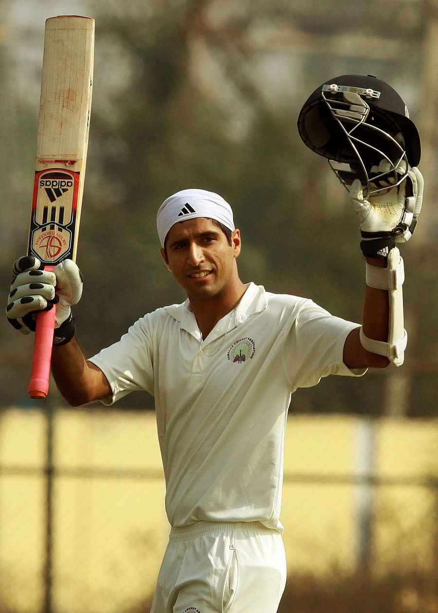 Rahul Dewan celebrates his double-century