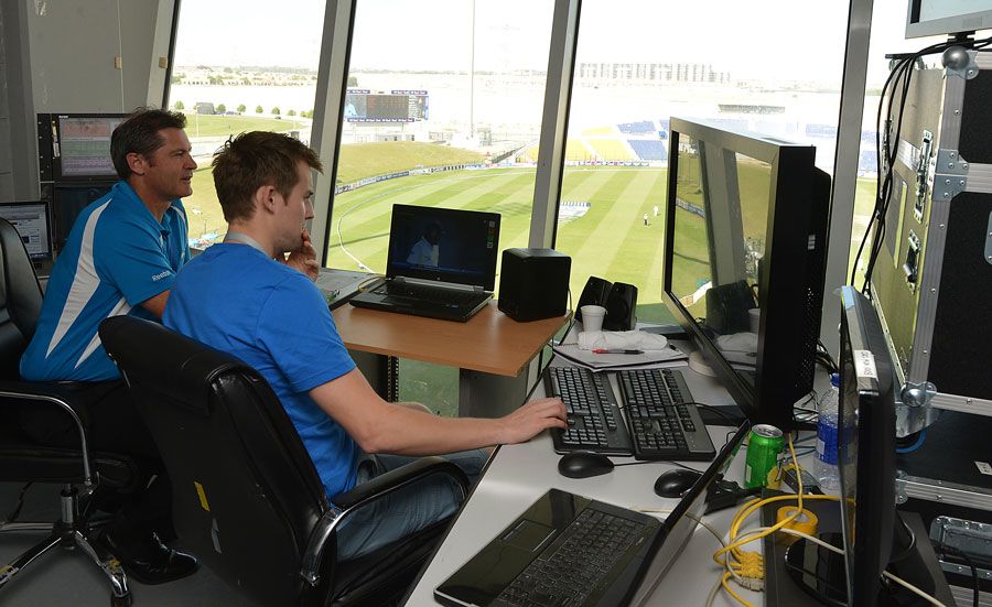 Simon Taufel examines footage for the Officiating Replay System