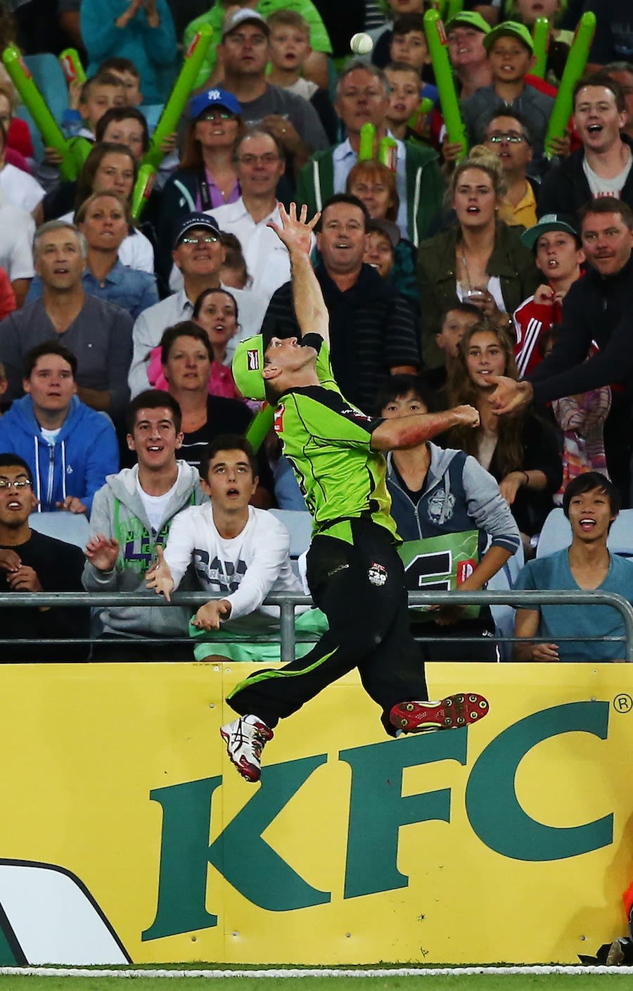 Cameron Borgas jumps in vain to catch the ball