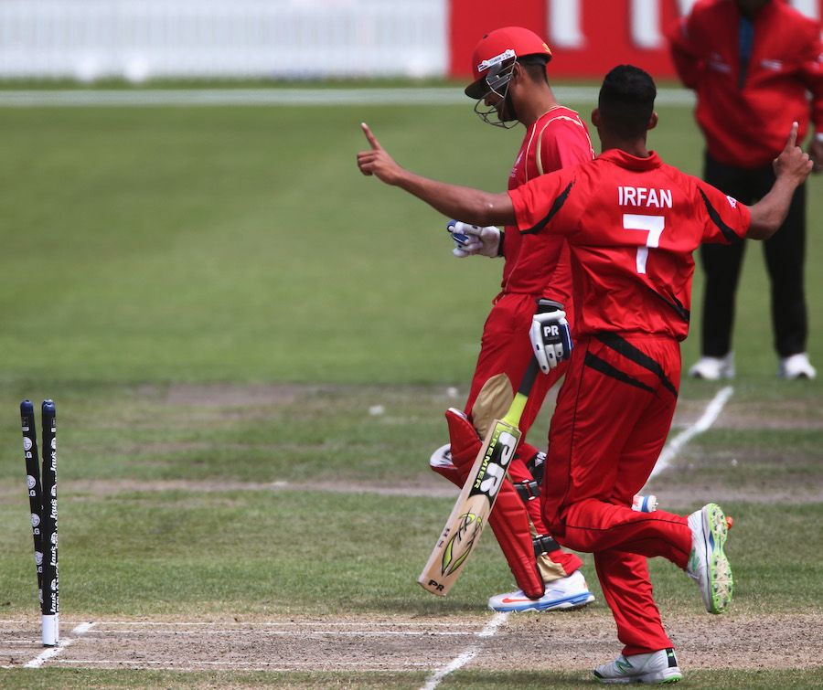 Irfan Ahmed hits the stumps to run out Harvir Baidwan