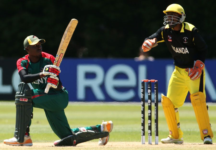 Alex Obanda sweeps during his innings of 80