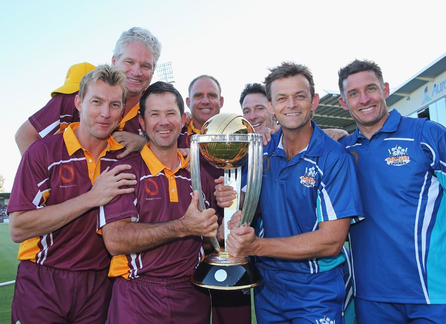 Australia's former World Cup winners pose with the trophy during the Ricky Ponting Tribute Match