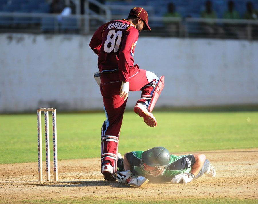 Denesh Ramdin and Max Sorensen try to avoid a collision