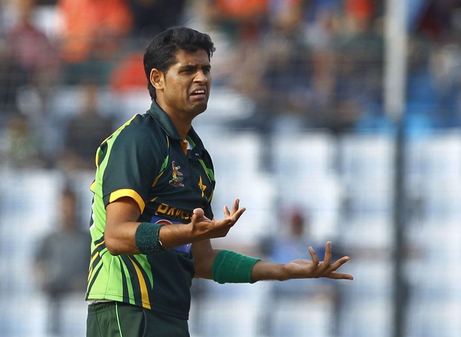 Mohammad Talha gestures after picking up a wicket