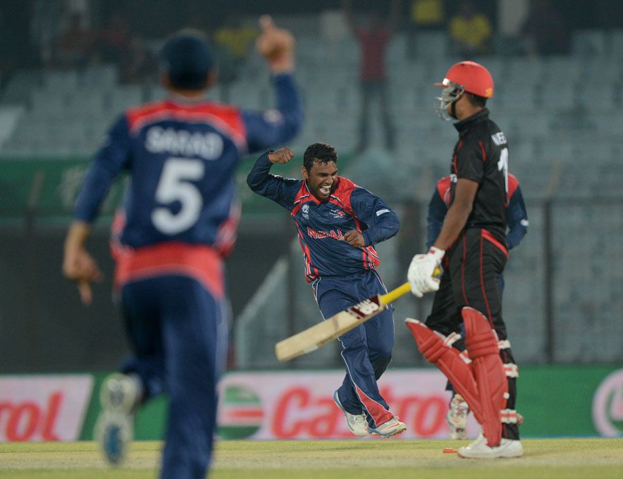 Jitendra Mukhiya celebrates the final Hong Kong wicket