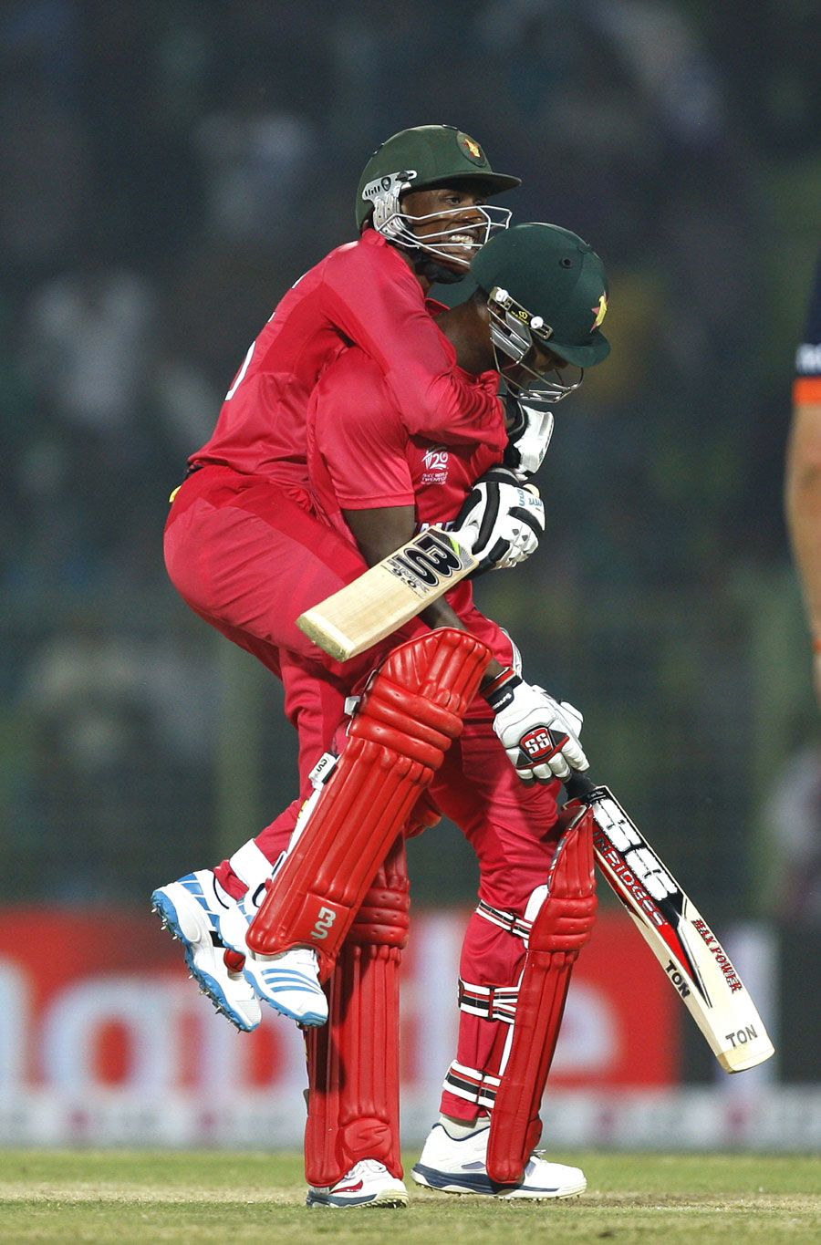 Vusi Sibanda and Timycen Maruma celebrate Zimbabwe's win