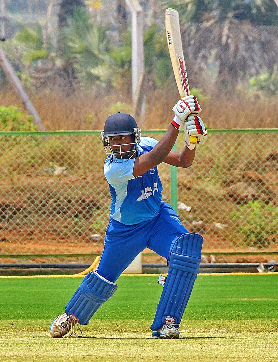 Prasanth Kumar drives during his unbeaten 33