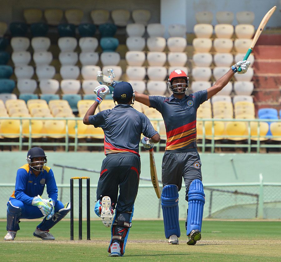 Goa's Amit Yadav celebrates after hitting a six of the last ball to seal a thriller