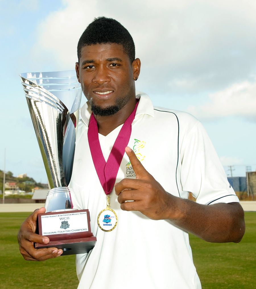 Damion Jacobs with Headley-Weekes Trophy