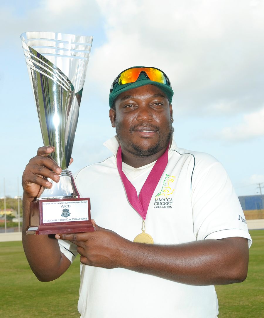 Jamaica captain Tamar Lambert shows off the Headley-Weekes Trophy