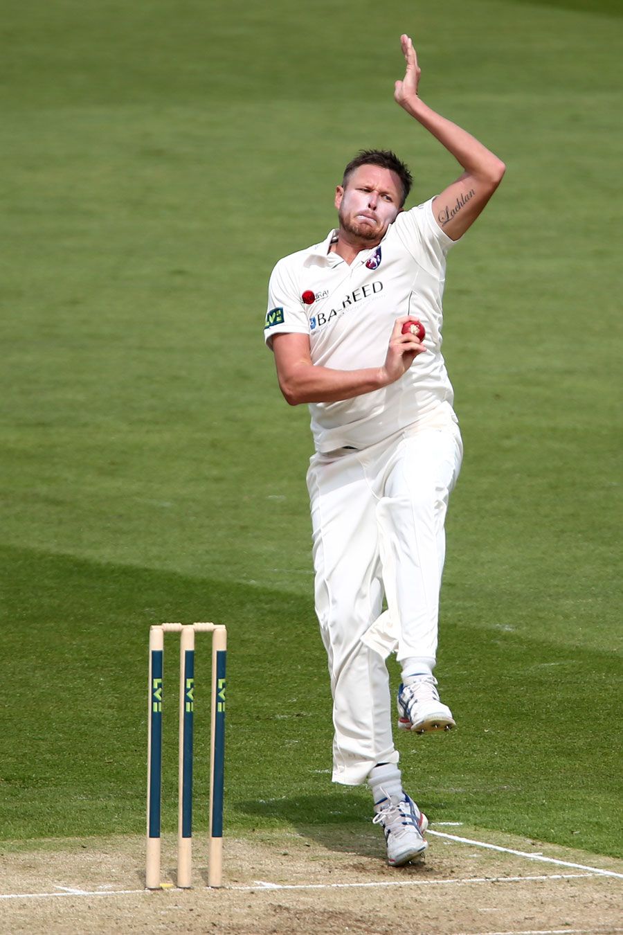 Mitch Claydon bowling for his new county