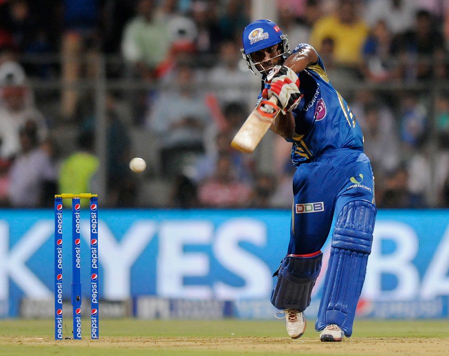 CM Gautam thumps the ball through the off side