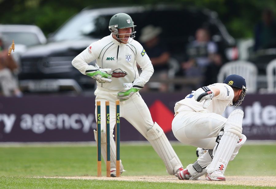 Ben Cox completes the stumping of Jaik Mickleburgh