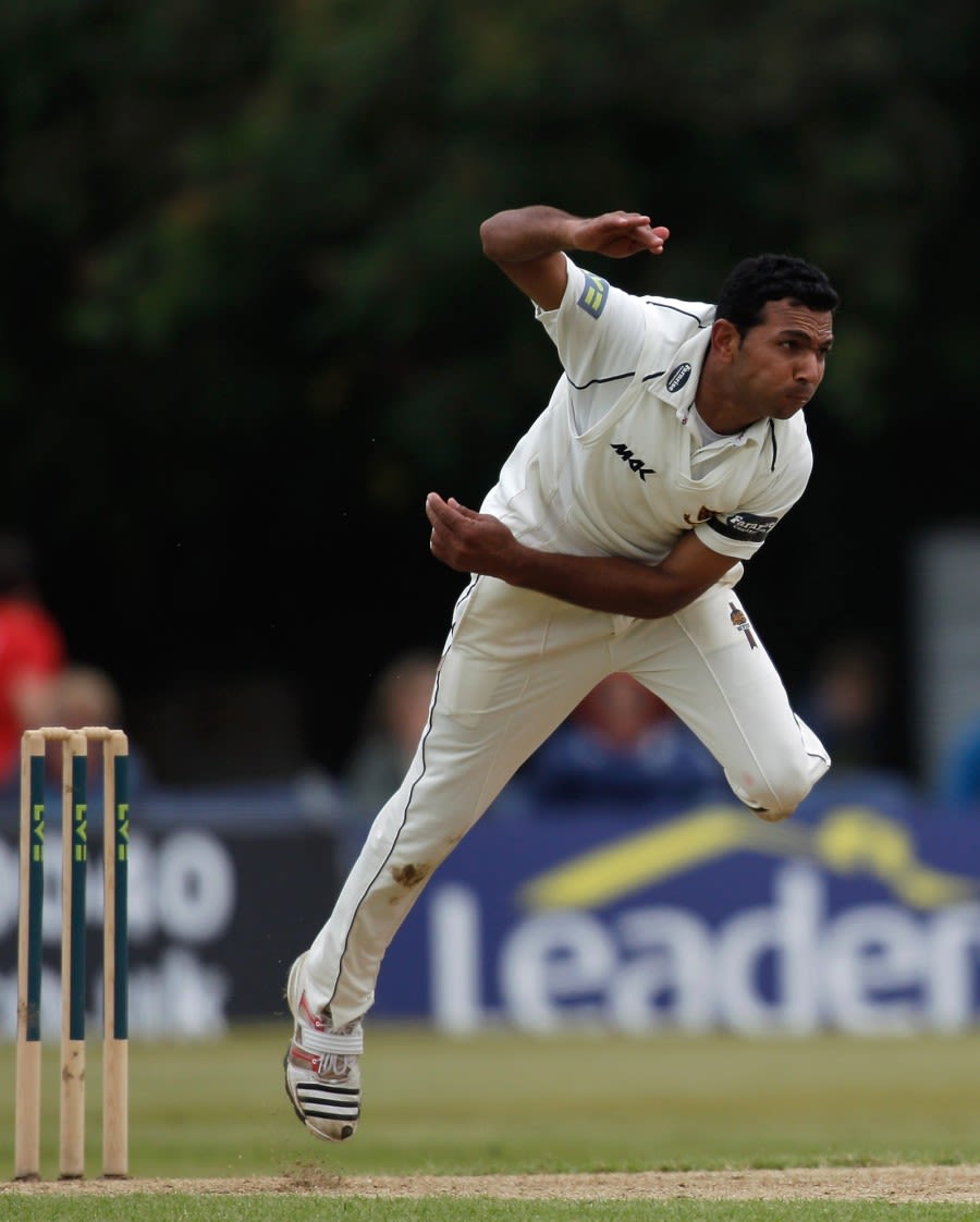 Naved Arif runs in to bowl
