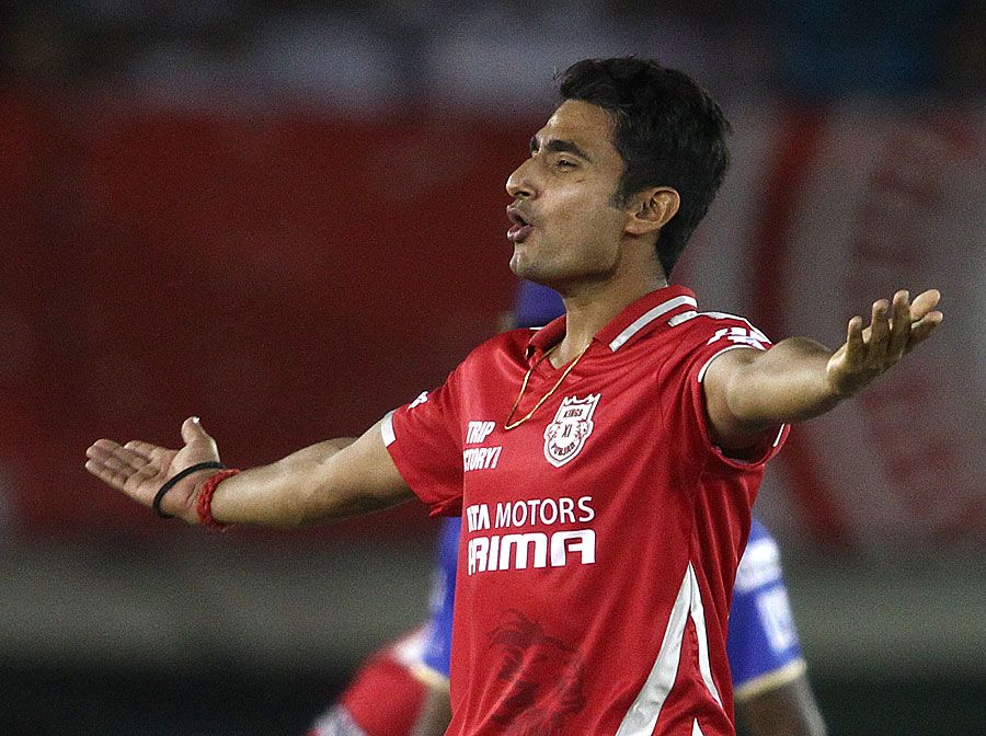 Karanveer Singh finished with impressive figures of 2 for 16 in four overs