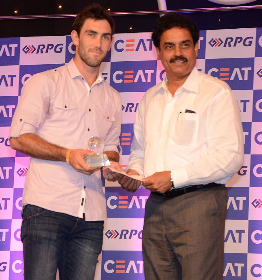 Glenn Maxwell receives an award from Dilip Vengsarkar at the CEAT Awards