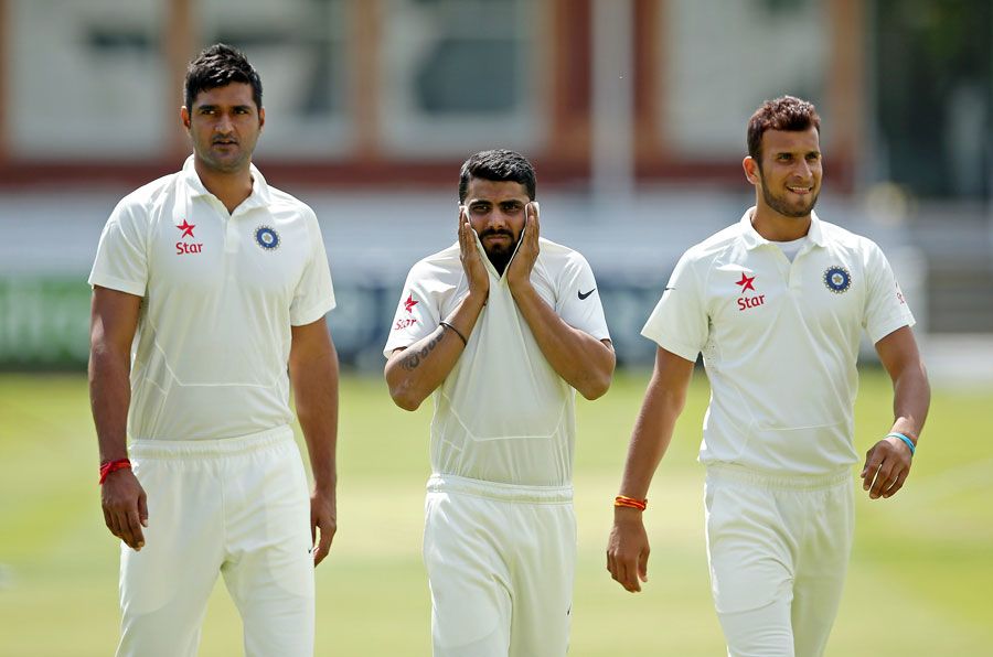 Ravindra Jadeja, Pankaj Singh and Ishwar Pandey walk back from training