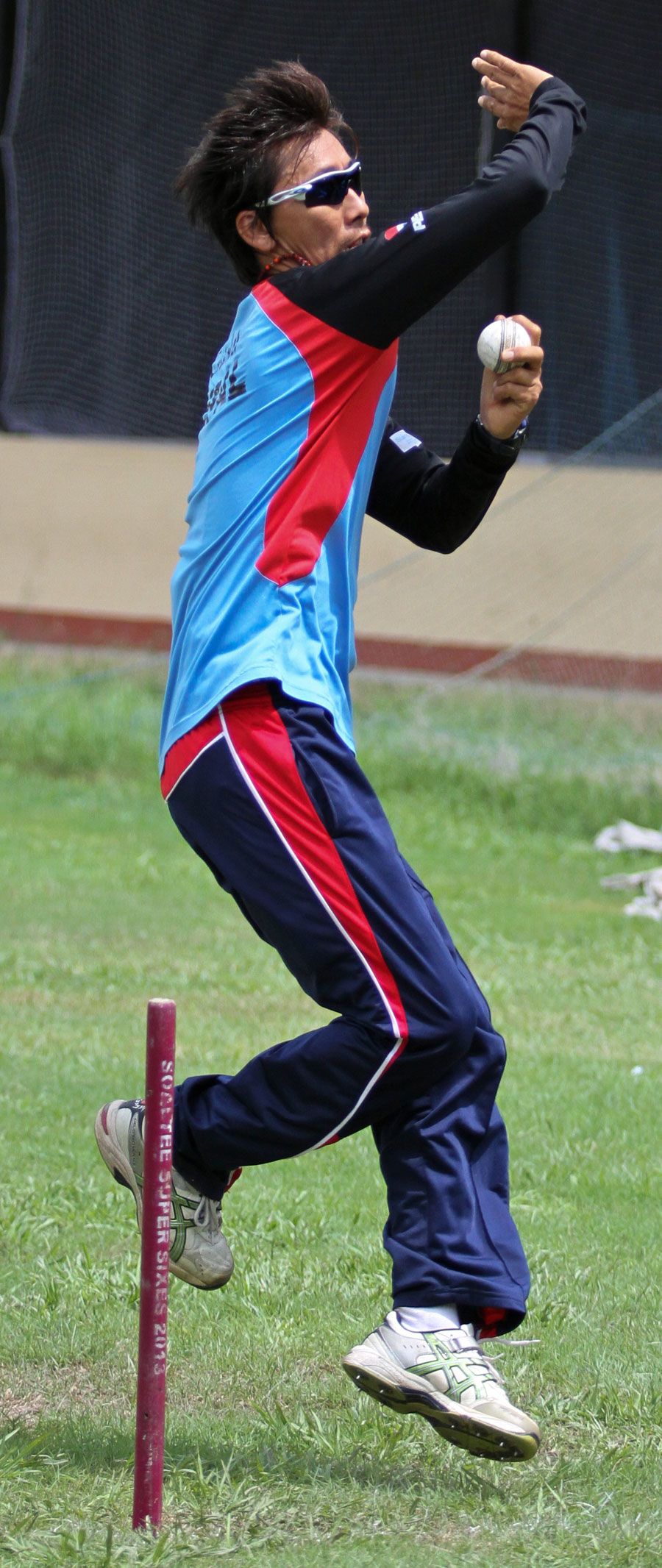 Shakti Gauchan bowls at a training session