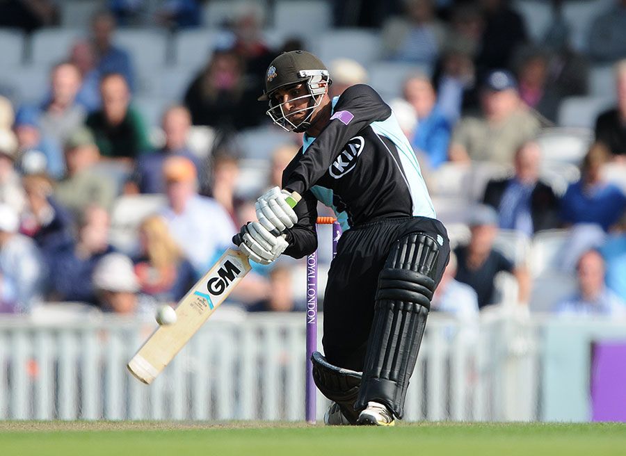 Aneesh Kapil swings down the ground on his way to a half-century