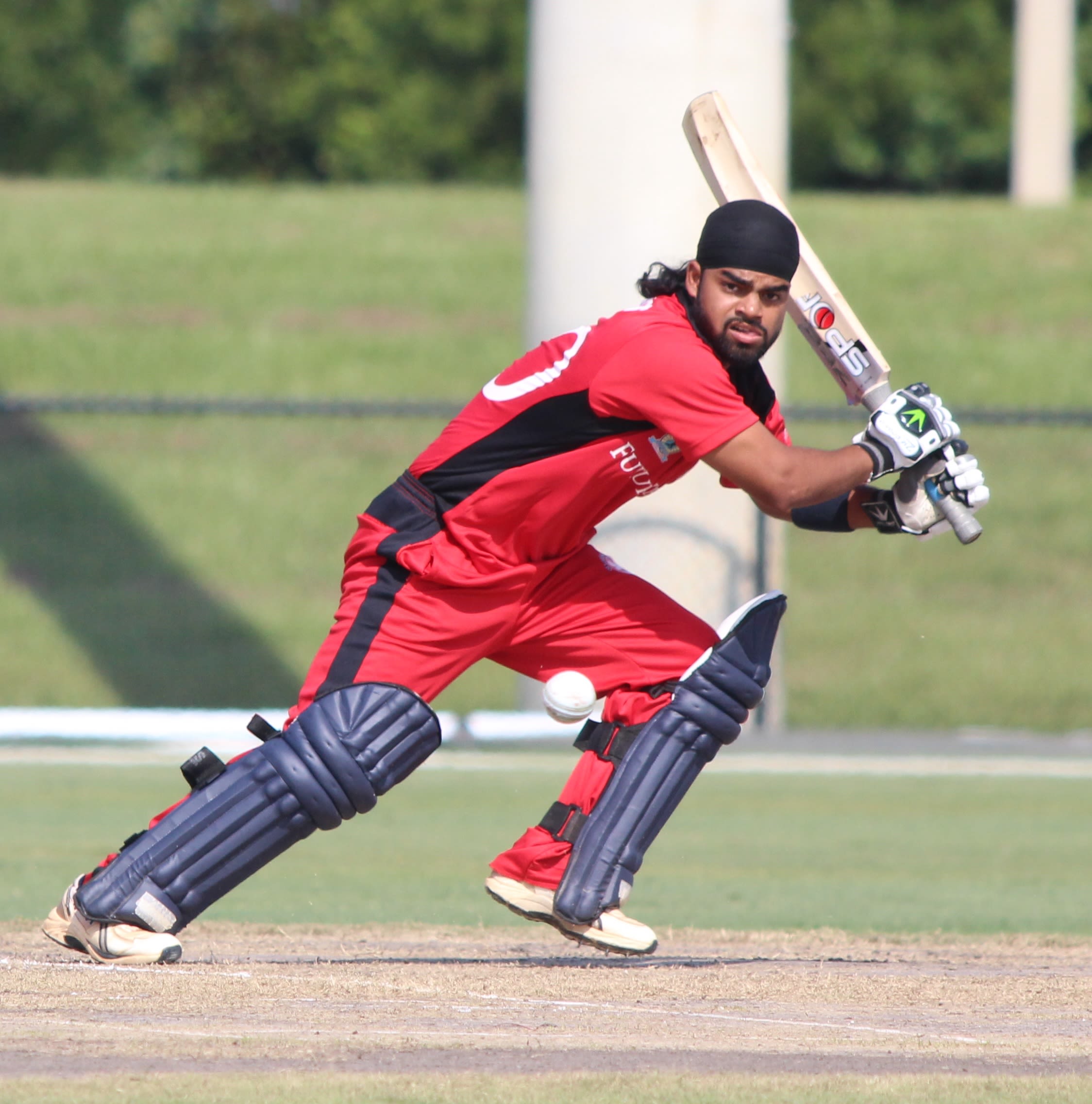 Charan Singh looks for a run behind point