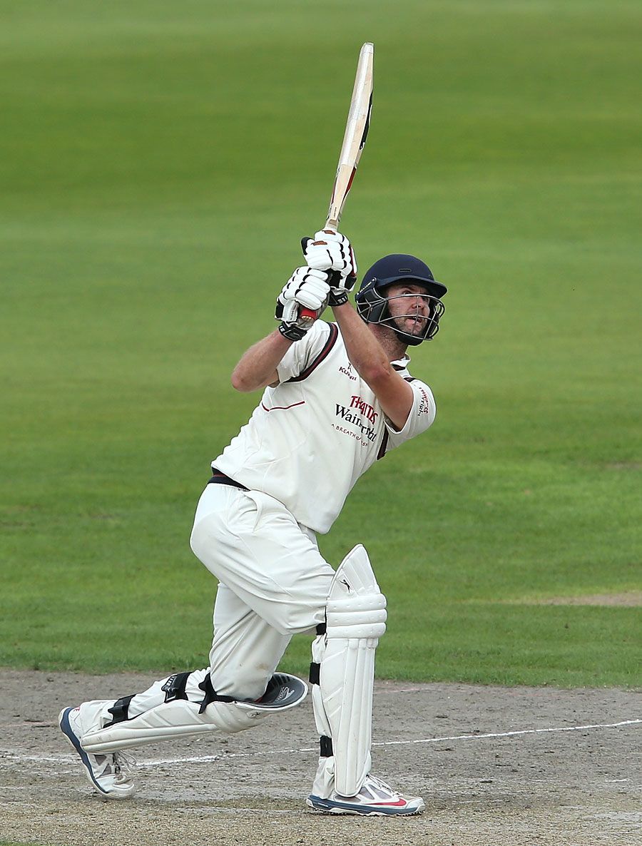 Tom Smith lofts down the ground during his 57