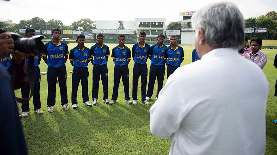Arjuna Ranatunga speaks to the Sri Lanka U-19 players ahead of the game