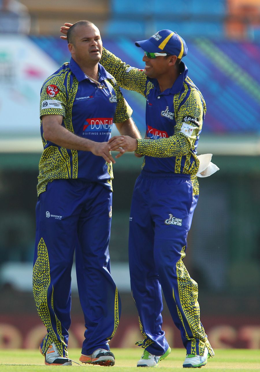 Charl Langeveldt gets a pat after dismissing Shane Dowrich