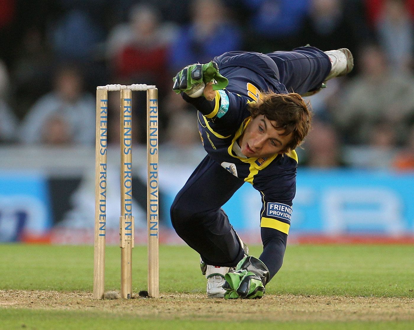 Michael Bates  misses the stumps as he attempts to run out Craig Kieswetter