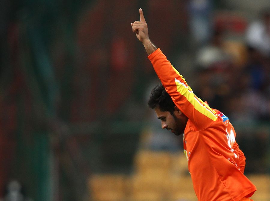 Mustafa Iqbal celebrates a wicket